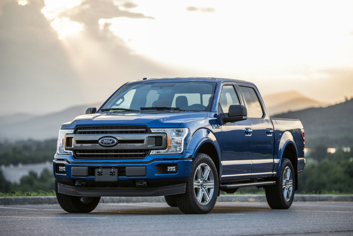 Blue Ford F-150 pickup — truck cap buying considerations