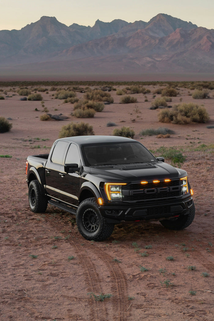 Black Ford F-150 with tonneau-covered bed